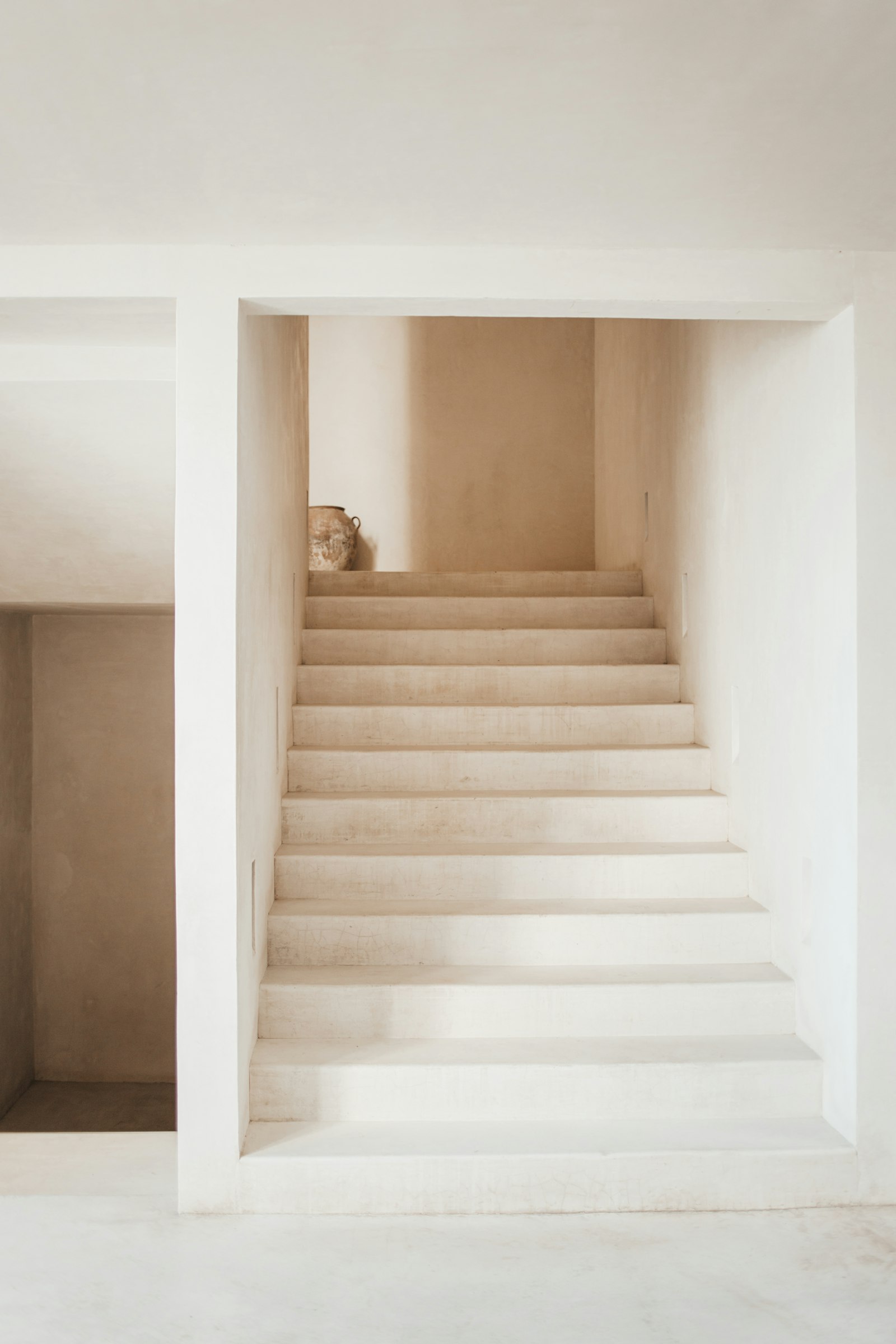Architectural detail — concrete wall texture with natural light shadows
